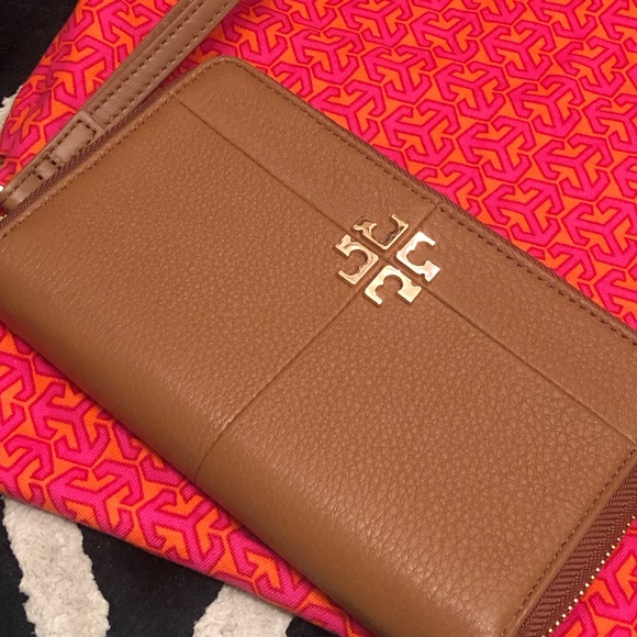 Tory Burch Accessories - Tory Burch zip all around wristlet.  Used twice. Can hold six credit cards.